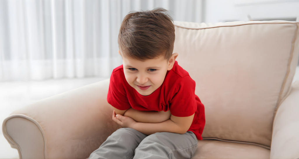 Dr. Mahesh providing gastrointestinal allergies treatment for children in a friendly clinic setting.